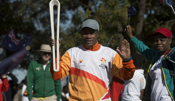 Olympic gold medal-winning marathon runner Josia Thugwane carried the Queen's Baton on the final leg of the African tour in South Africa ©Gold Coast 2018