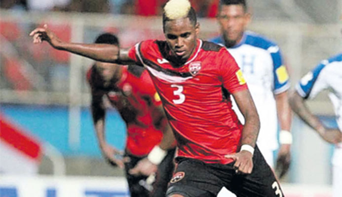 T&T midfielder Joevin Jones scores the only goal from the penalty spot against Honduras in their Concacaf Zone qualifier last night at the Ato Boldon Stadium, Couva. PHOTO: NICHOLAS BHAJAN/ CA IMAGES