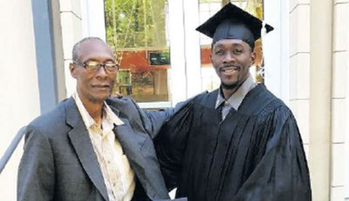 T&T’s sprinter Marc Burns, right, with his father Alec after graduating with a Bachelor of Science degree in Exercise Science (Physical Conditioning and Performance) at Auburn University in Alabama, USA on Sunday.