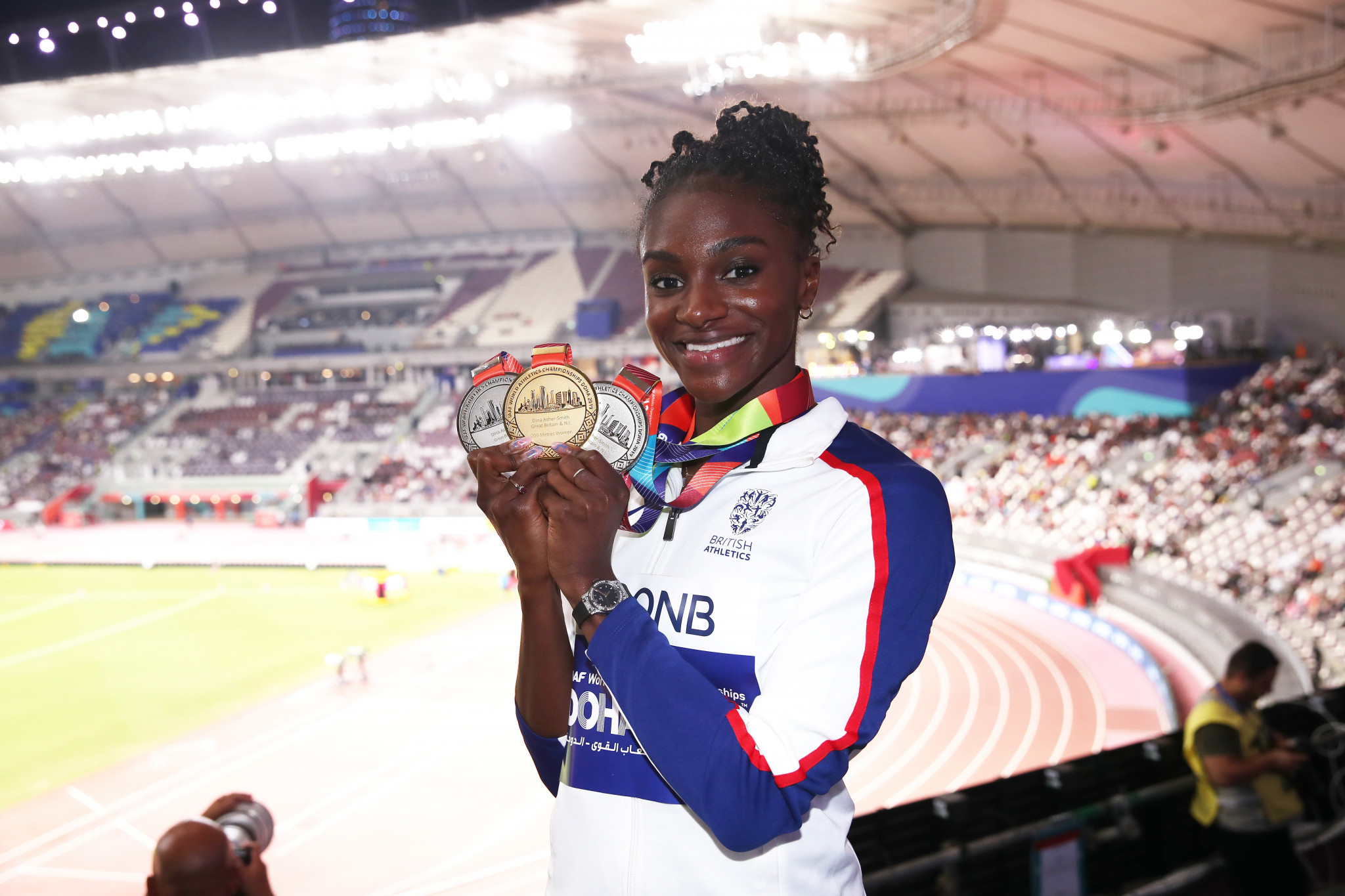 Britain's world 200m champion Dina Asher-Smith has said the IOC ban on podium protests is "a shame" ©Getty Images