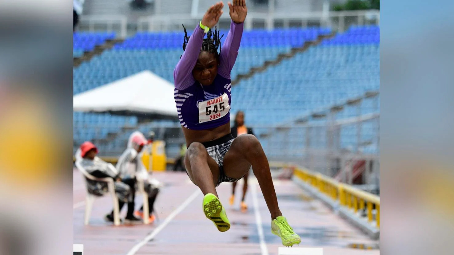 GOLDEN LEAP: Janae De Gannes leaps to victory in the Girls Under-20 long jump on day two of the NGC/NAAATT National Championships at the Hasely Crawford Stadium, in Port of Spain, on Saturday. De Gannes disturbed the sand at 6.22 metres.  —Photo: DENNIS ALLEN for @TTGameplan (Image obtained at trinidadexpress.com)