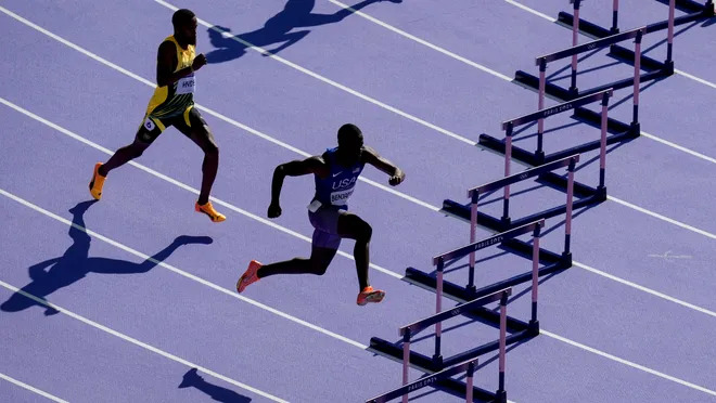 Rai Benjamin (USA) and Jaheel Hyde (Jamaica) in the 400-meter hurdles preliminary heat during the Paris 2024 Olympic Summer Games at Stade de France on Aug. 5, 2024. Andrew Nelles, USA TODAY Sports (Image obtained at usatoday.com)