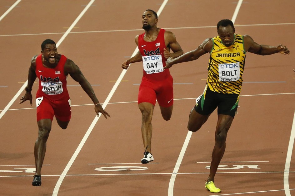 United States’ silver medal winner Justin Gatlin, United States’ Tyson Gay and Jamaica’s gold medal winner Usain Bolt, from left, cross the line in the men’s 100m final during the World Athletics Championships at the Bird’s Nest stadium in Beijing, Aug. 23, 2015. (AP Photo/Mark Schiefelbein) (Image obtained at tt.loopnews.com)