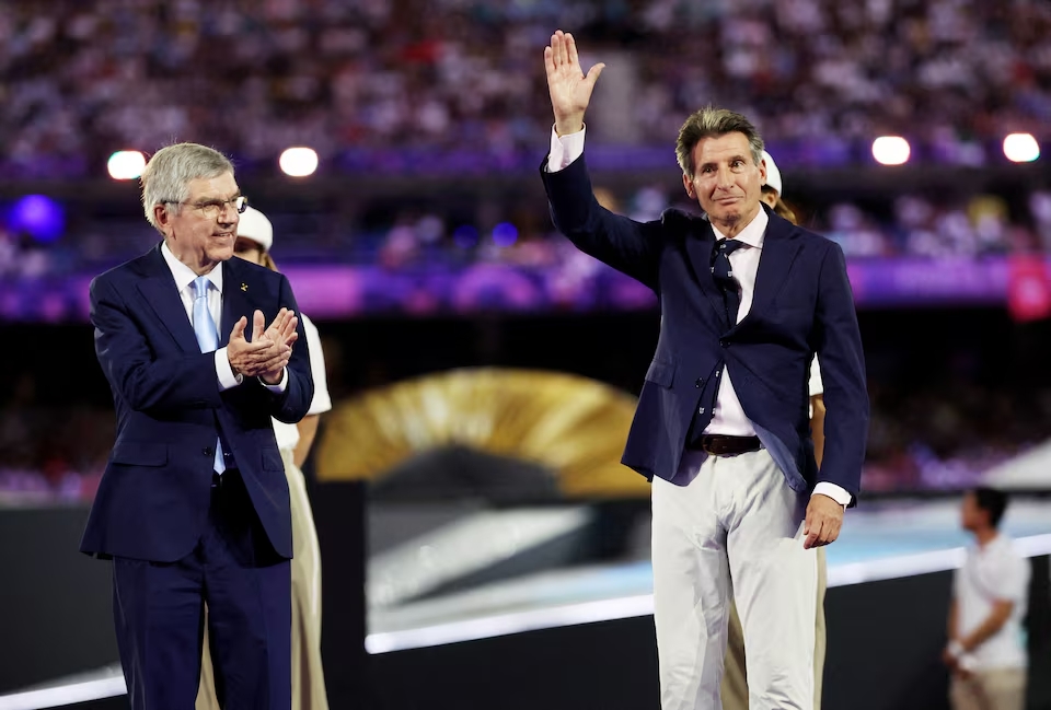 Paris 2024 Olympics - Athletics - Women's Marathon Victory Ceremony - Stade de France, Saint-Denis, France - August 11, 2024. International Olympic Committee (IOC) President Thomas Bach and World Athletics President Sebastian Coe during the medal ceremony REUTERS/Phil Noble/File Photo (Image obtained at reuters.com)